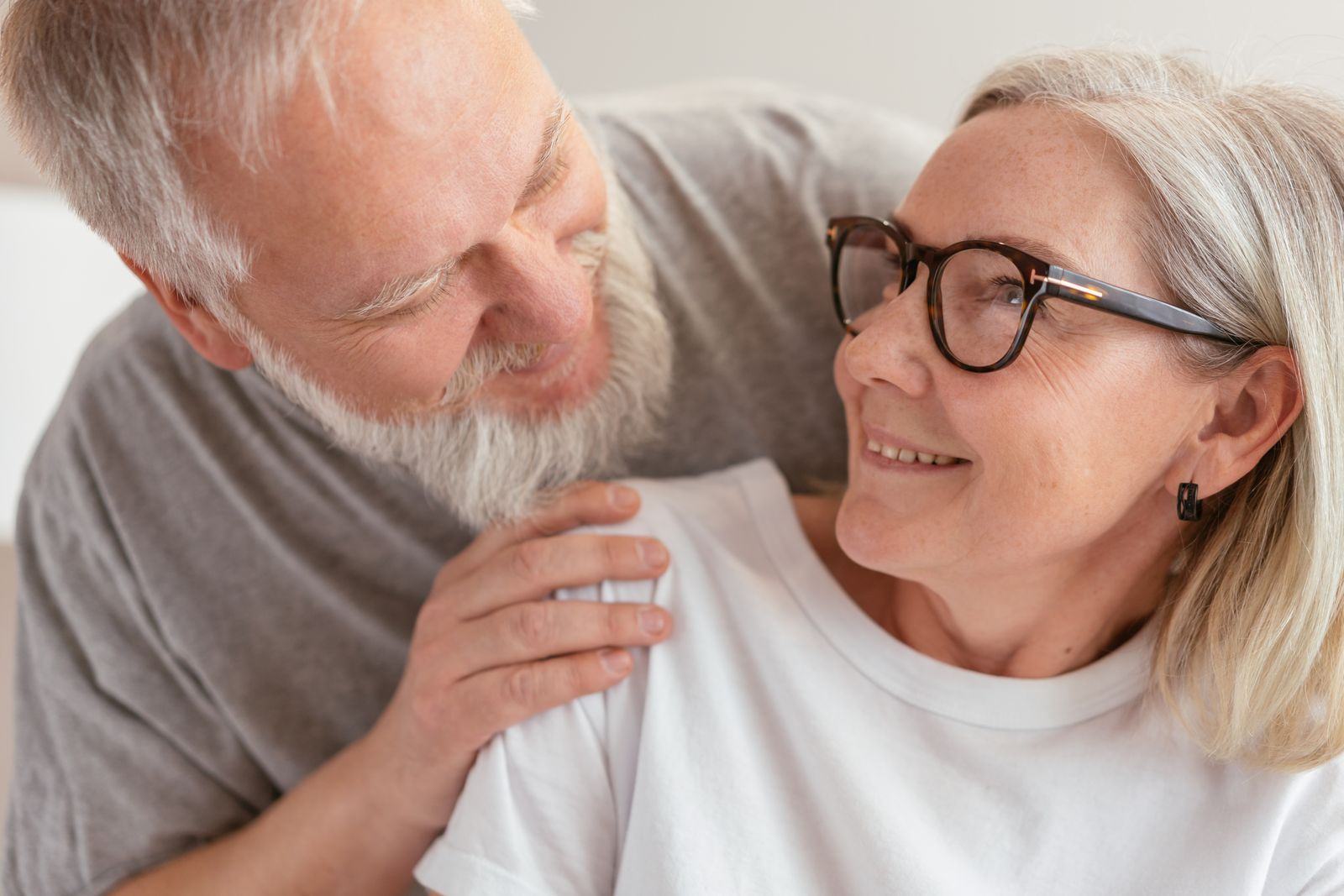 An older couple laughing carefree
